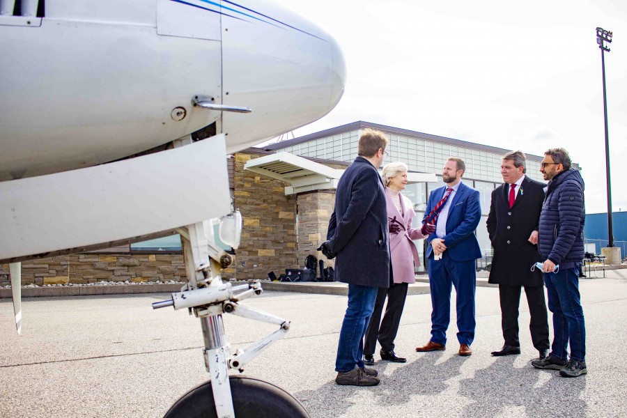 Politicians and Robin Garrett discuss safety investments at Niagara District Airport. (Evan Saunders)