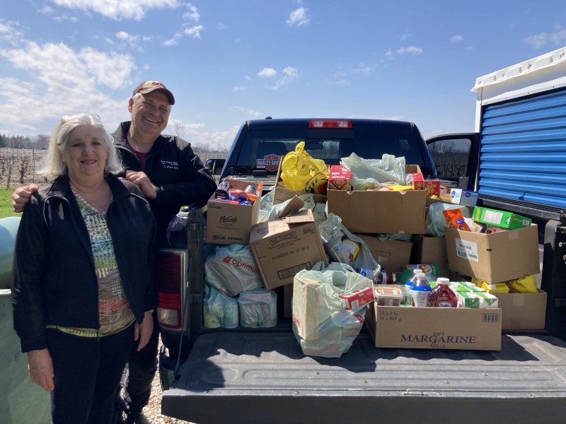Cindy Grant and Coun. Erwin Wiens with a truckload of donations for Newark Neighbours. (Dorothy Soo-Wiens/Supplied)