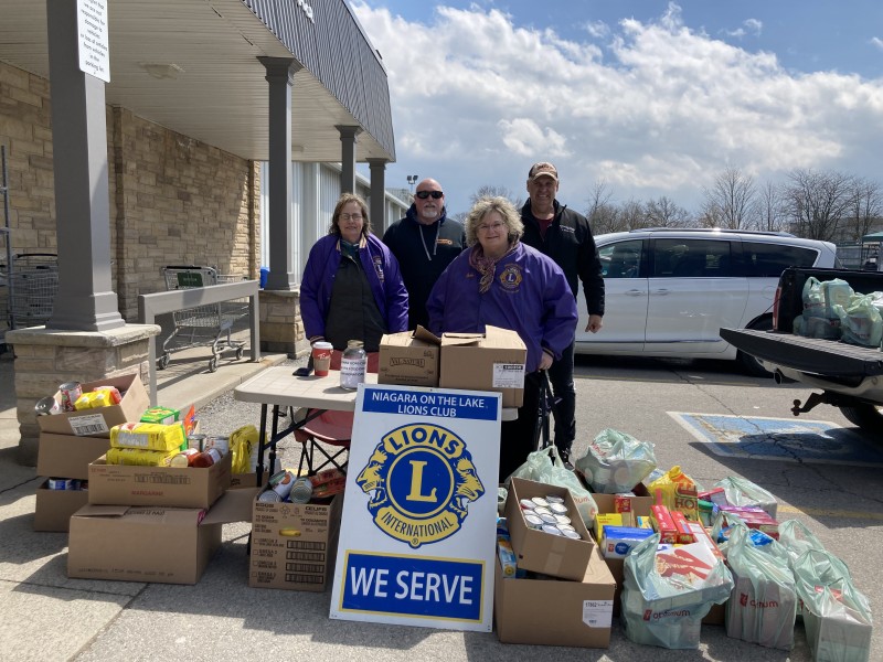 Niagara Lions collecting donations at Phil's Independent Grocer. Pictured are front row: Victoria Skubel and Heather Priestly, back row: Dave Priestley and Erwin Wiens. (Dorothy Soo-Wiens/Supplied)