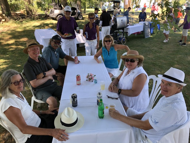 Enjoying the post-round barbecue, clockwise, Suzanne and Charlie Rate, Jim McMacken,  Stephen Warboys, Louise Robitaille, Janice McMacken, Susan and Dean McCann. (Kevin MacLean photo)