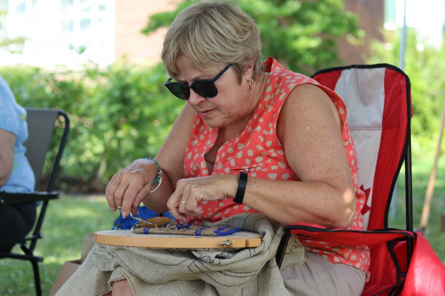 Janet Guy of St. Catharines Rug Hooking Guild said it's been three years the organization has been participating in the heritage festival in NOTL. (Dariya Baiguzhiyeva/Niagara Now)