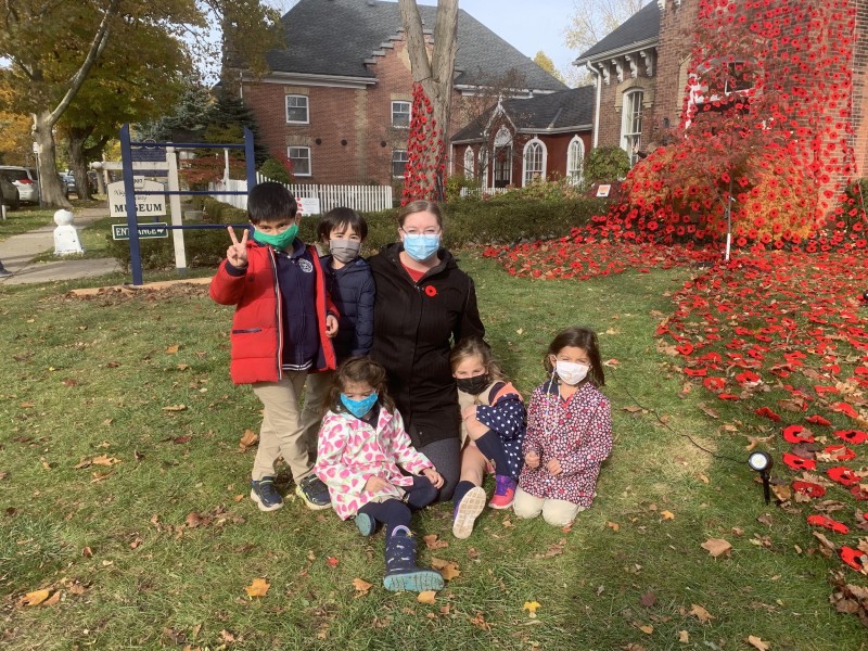 Students from Royal Oak Academy viewing the NOTL Museum’s poppy display.