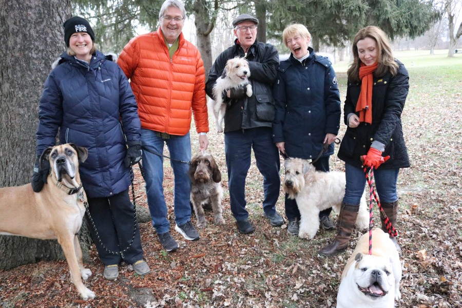From left: Maureen Dodd with her dog Miles, Frank Wynia and his dog Coco, John McCallum holds his dog Sykes, Carol Williams with Connor and Nikki Jenkins with a bulldog called Winston. (Dariya Baiguzhiyeva/Niagara Now)