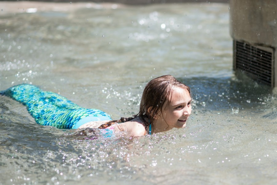 Spotted, mermaid swimming at Simcoe Park fountain in NOTL. (Eunice Tang/Niagara Now)