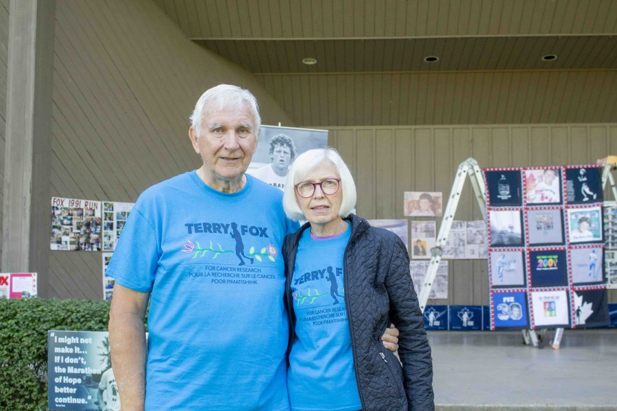 Lee and Len Bishop. Lee made the quilt seen in the background of the photo out of past Terry Fox Run t-shirts supplied by Joan King. (Evan Saunders)