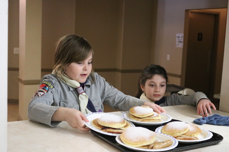 The 38th annual pancake breakfast took place Sunday at St. Davids Lions Club. The goal was to raise money for 1st St. Davids Scouting group. Claire Vanderlee, left, and Teia Epp. (Dariya Baiguzhiyeva/Niagara Now)