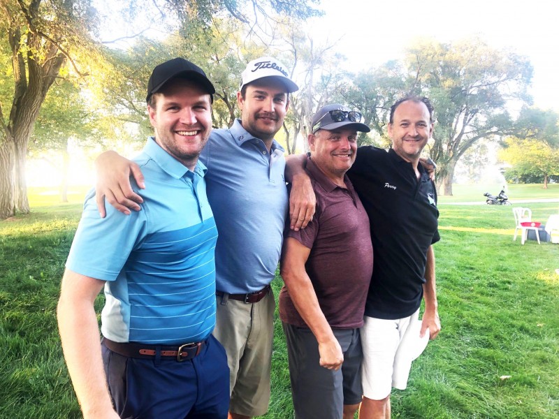 Tournament winners Clark Robertson, Evan McCaughey, Greg McCaughey and Perry Johnson. (Kevin MacLean)