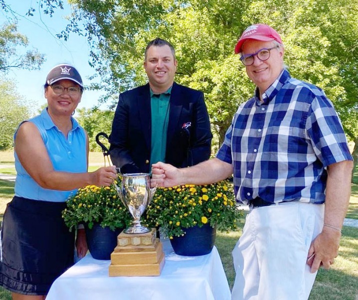 The Matrimonial Cup winners, May Chang and Kevin MacLean, with club pro Billy Simkin. (Patty Garriock photo)