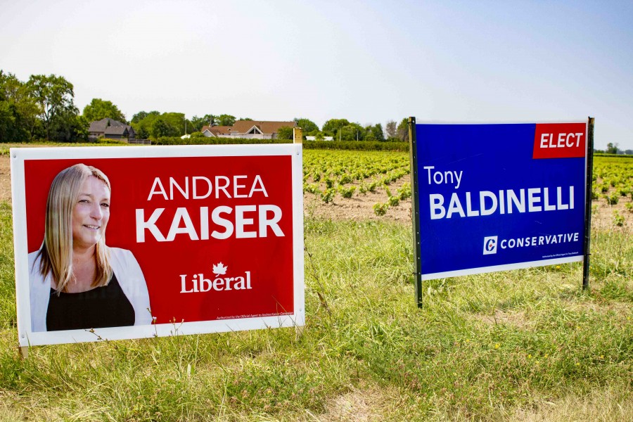 Election signs, mainly for liberals and conservatives, are sprouting up around town. (Evan Saunders)