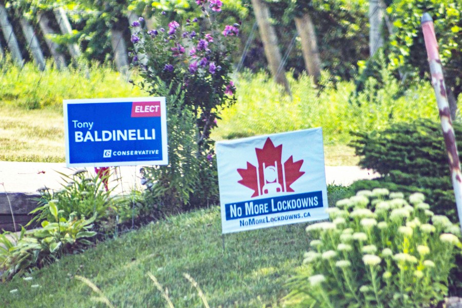 Election signs, mainly for Liberal and Conservative parties, are sprouting up around town. (Evan Saunders)