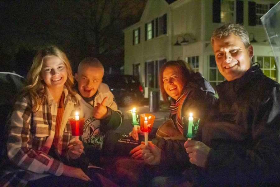 The Botbyl family settle in for their carriage ride leading the Candlelight Stroll. (Evan Saunders)