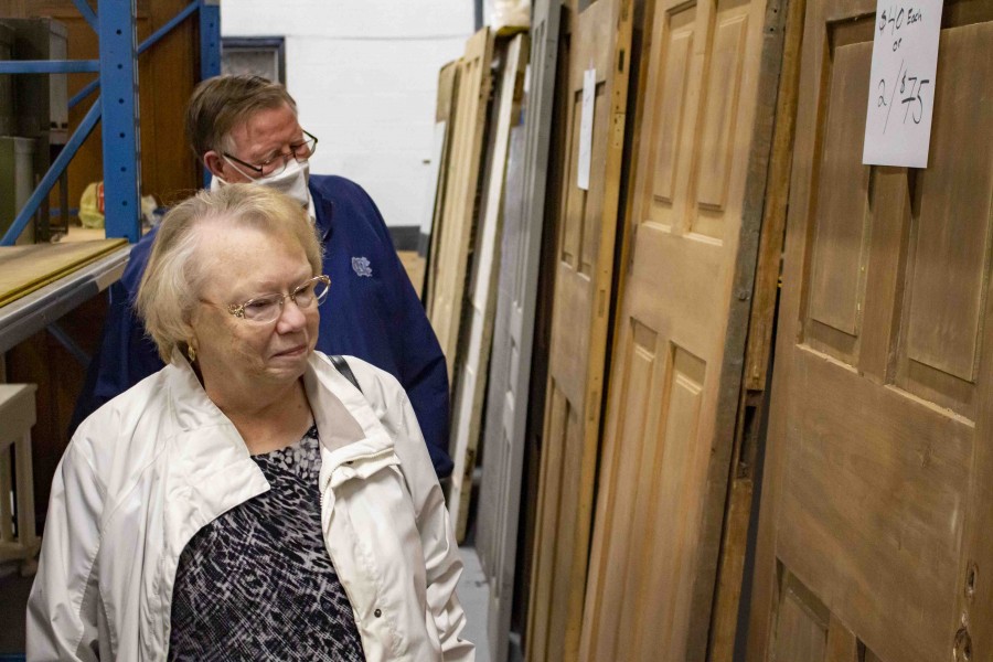 Bonnie and Clair Boyda search through some of Liz Hawley's staging items at the sale on York Road on Sunday. (Evan Saunders)