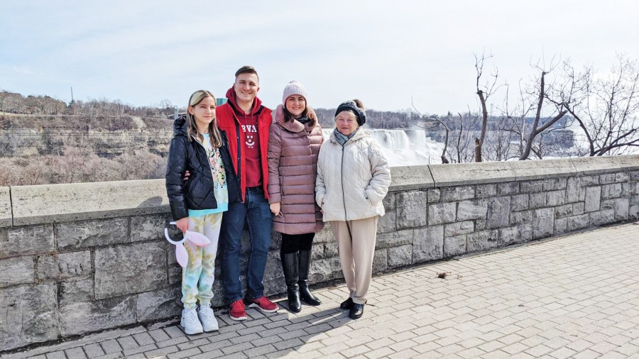 Anastasia, Artur, Tatiana and Oleksandra Tymchyshyn take a family photo in front of Niagara Falls after arriving in Canada from Ukraine three weeks ago. (Supplied by Artur Tymchyshyn)
