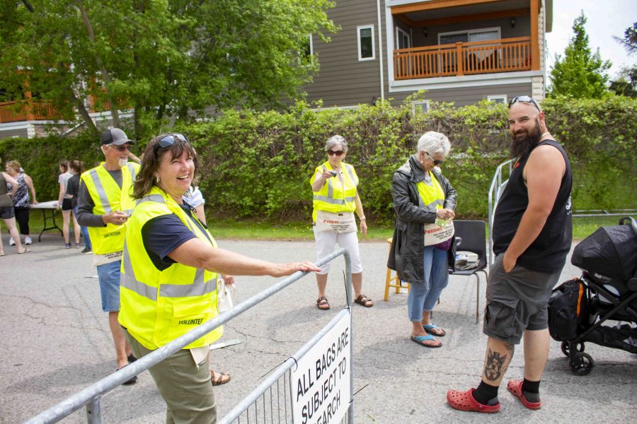 Rose Stadelmier, Allon Stadelmier and Linda Nickel were busy organizing the front gate on Saturday. (Evan Saunders)