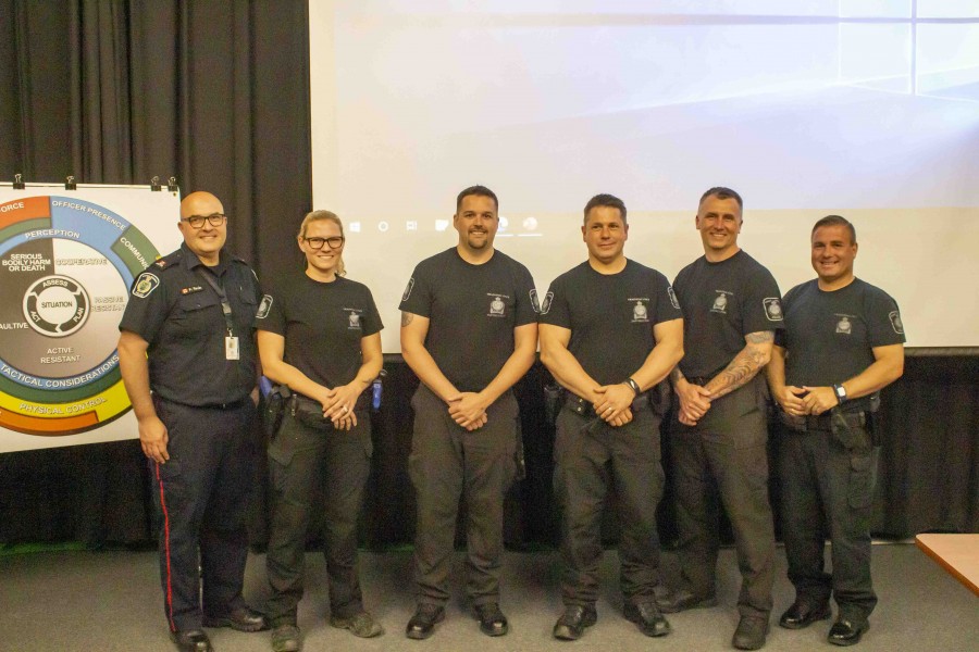 Constables Philip Gavin, Brittany Wright, Andrew Watson, Matt Whiteley, Chad Davidson and Rich Vujasic all had a hand in training journalists on use of force education. (Evan Saunders)