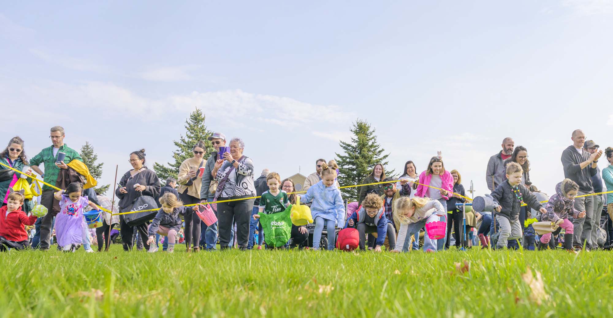 Kids get ready to race for chocolate eggs at the annual Kinsmen egg hunt on Saturday. 