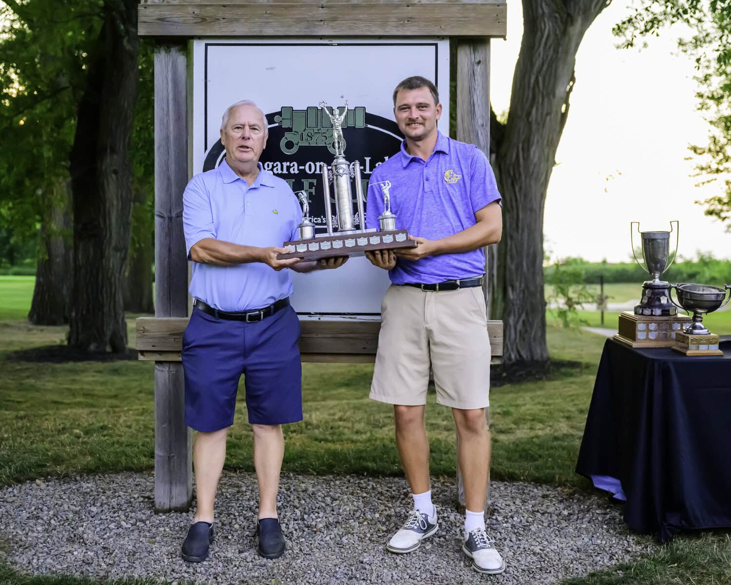 As part of the NOTL Golf Club's 150th anniversary celebrations, former club pro and longtime member Wayne Cardiff presented the men's championship trophy to James Grigjanis-Meusel. 