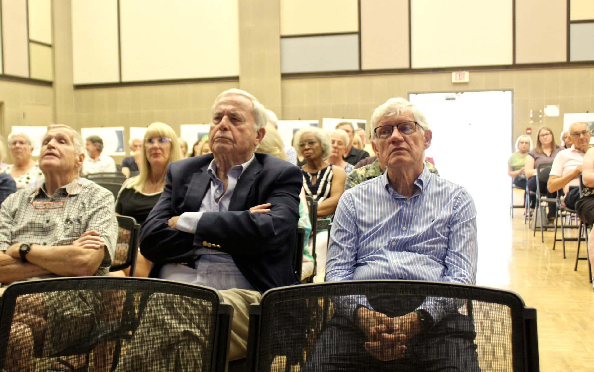 Some of the few dozen residents that came out to the public consultation on Aug. 13 at the NOTL Community Centre, a few of whom vocally shared their opposition to Signum Wireless' plans during the meeting.