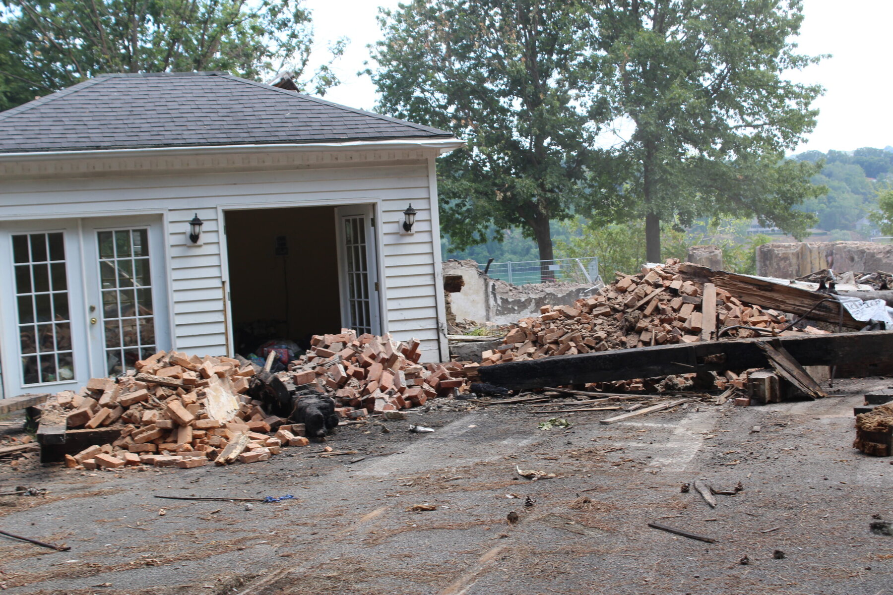 The Glencairn Hall property as it appeared on Friday. By this point, the distinguishing chimneys of the Hall were gone.  