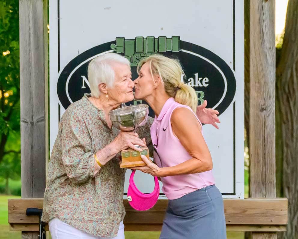 The NOTL Golf Club is commemorating its 150th year and to help celebrate, longtime member Barbara Ahluwalia, 92, presented the trophy to women's champion Louise Robitaille.