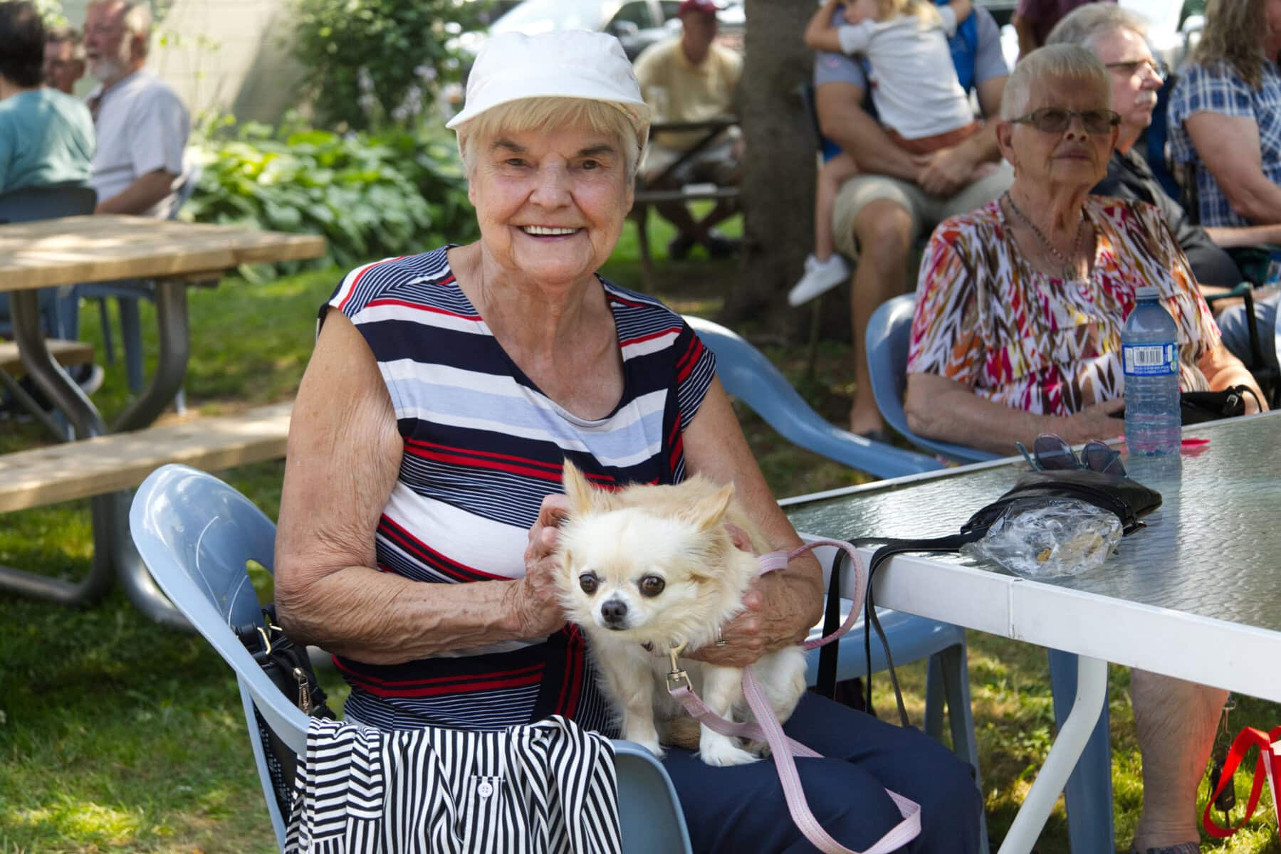 Rose Shaver and her pup Sophie enjoy the live music at the Legion's civic holidiay celebration.
