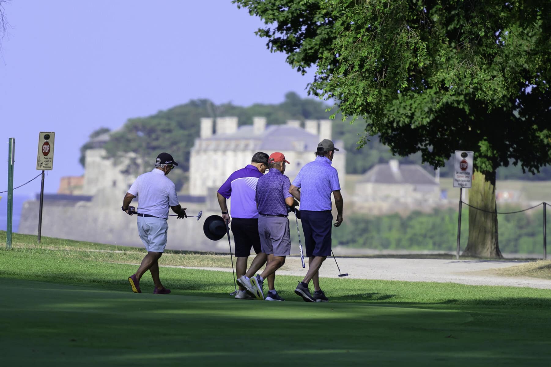 The foursome off Jim Garrett, Tony Sanfelice, Brian Herr and Norm Kerr walk off the ninth green. 