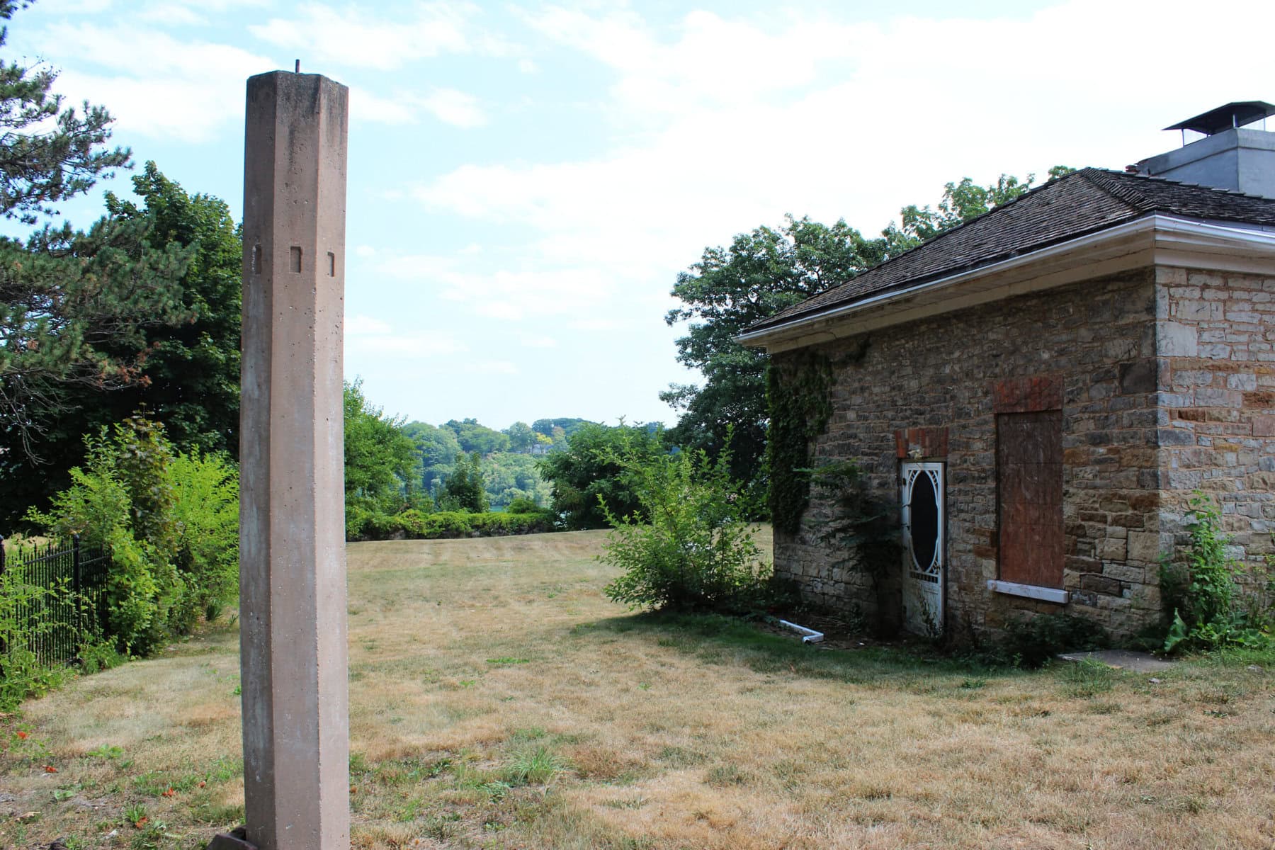 The chimney and stone schoolhouse on 14785 Niagara River Parkway. They are the sole remaining remnants of a property that used to be part of the Glencairn Hall property at neighbouring #14795.