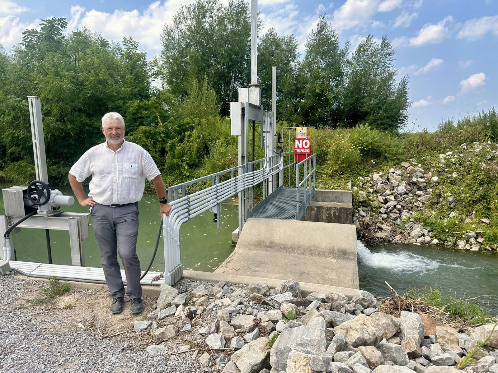 Deputy Lord Mayor Erwin Wiens stands beside a section of the irrigation system at St. David’s Hydroponics, which he says was installed with past infrastructure funding and is an example of the kind of projects Niagara-on-the-Lake wants to see more of. 