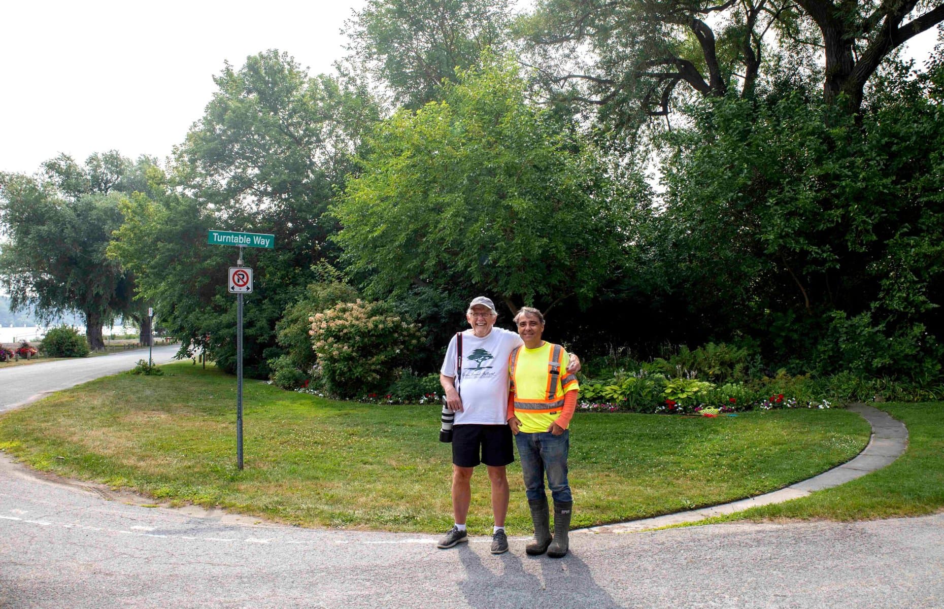 Ron Simkus, left, and Frank Racioppo stand at the turntable site in Niagara-on-the-Lake, where community efforts are underway to restore a 60-foot limestone ring used to rotate steam trains in the 1800s.