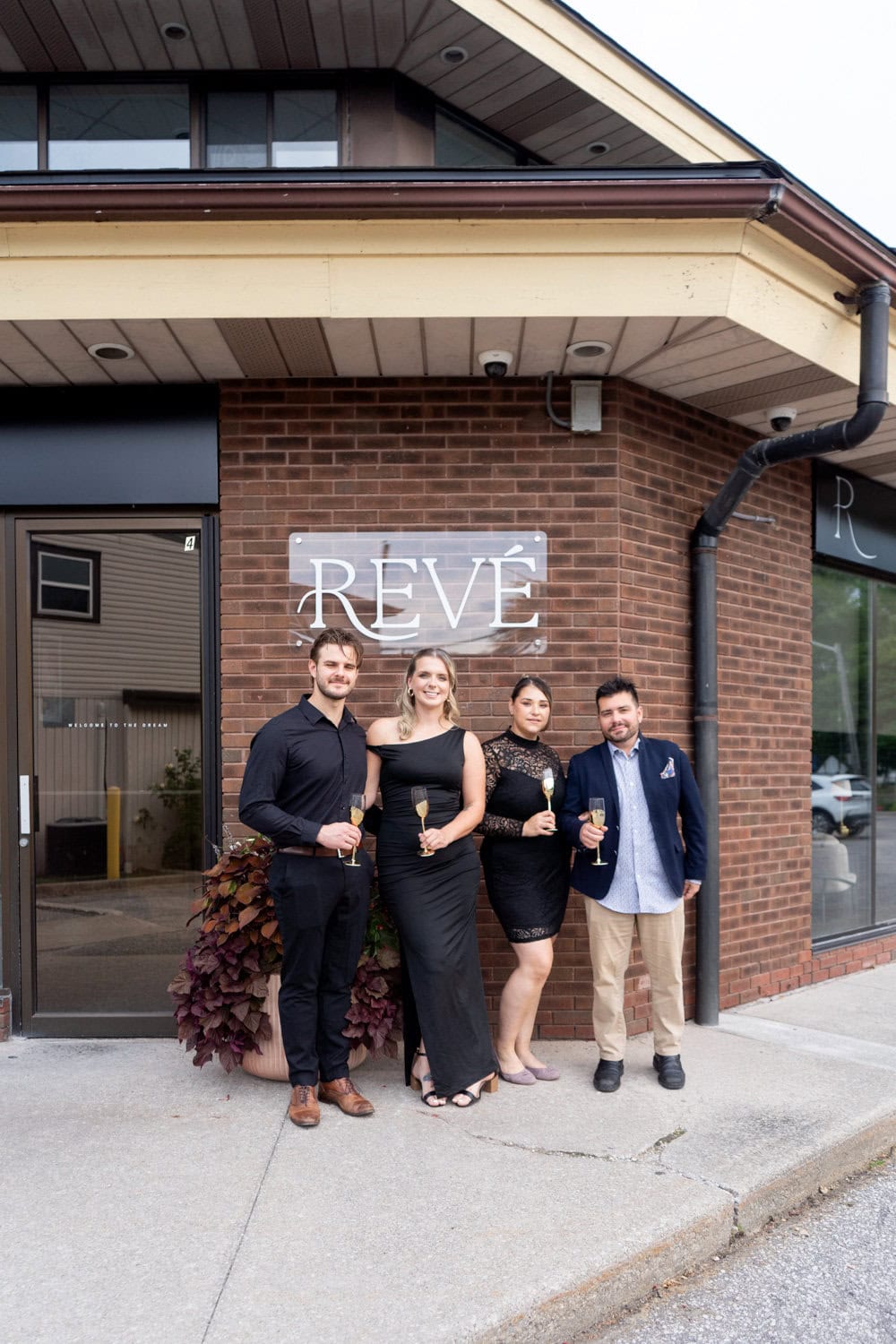 From left, Revé partners Kevin Gillingham, Anna Kruusi, Nicole Pisarenko and Adriano Cappuzzello stand outside the restaurant, which officially opened Aug. 28.