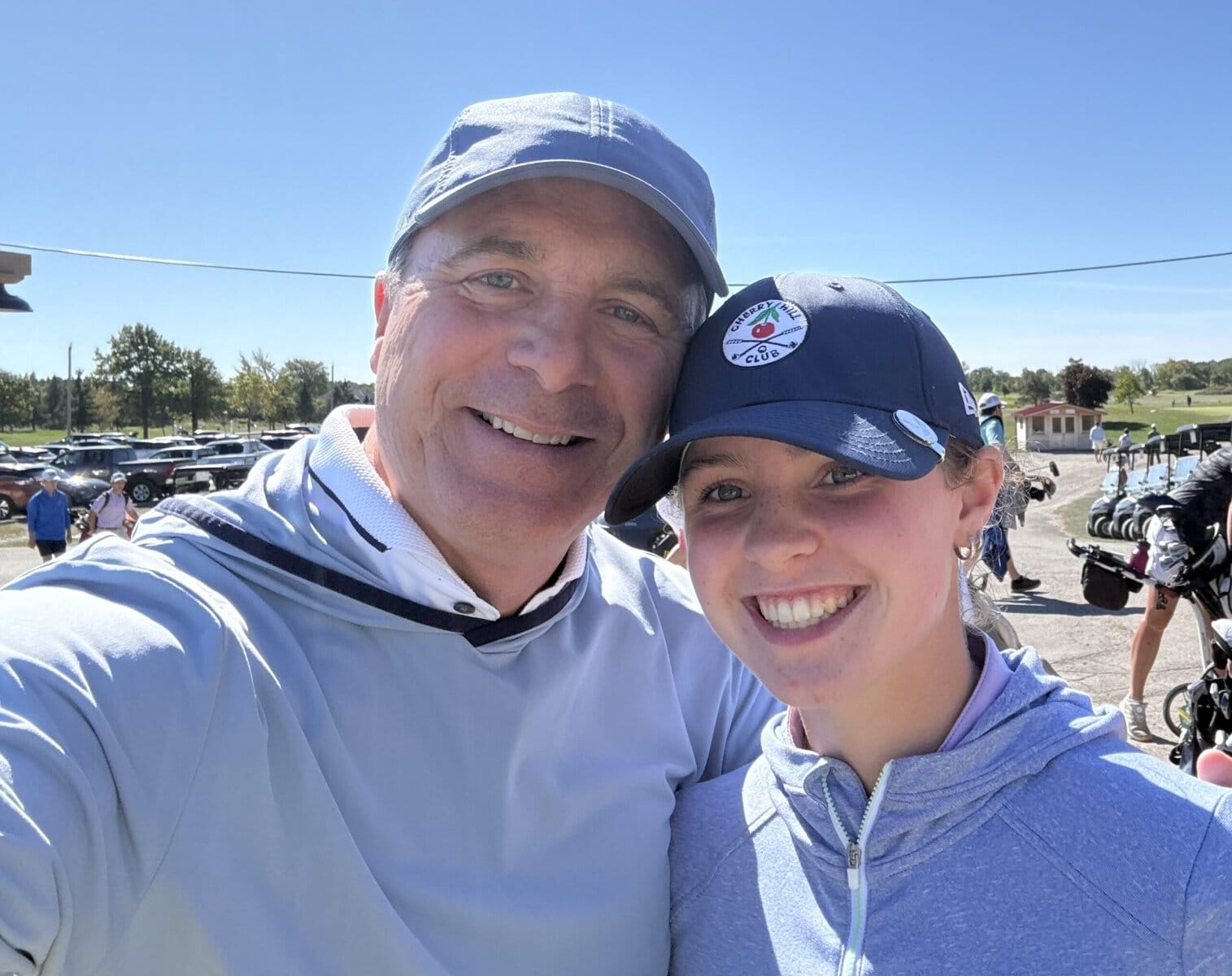 NOTL golfer Natalie Simpson is all smiles with her caddy, her uncle Jamie Skinner. Simpson, 14, placed second in the junior girls division at the Champion of Champions tournament last Saturday at Cardinal Lakes Golf Club. 