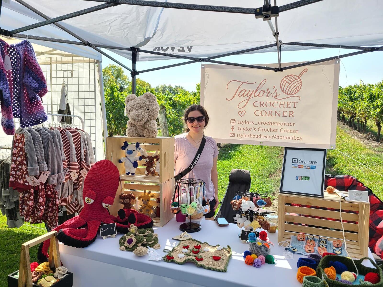Taylor Boudreau of Taylor’s Crochet Corner displays her handmade creations, including stuffed animals, keychains, and Barney the octopus, at the market. 