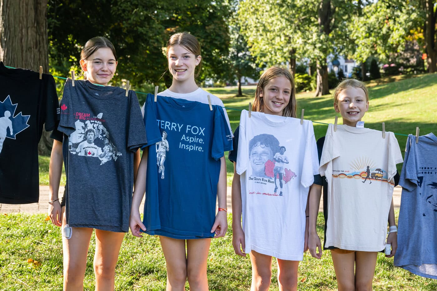 Some of the Terry Fox Run's young participants stand behind a few of the T-shirts that have makred the run over the past several years. From left stand, Greta Sobol, 13, Billie Swan, 12, Cassidy Swan, 11 and Eve Sobol, 10.