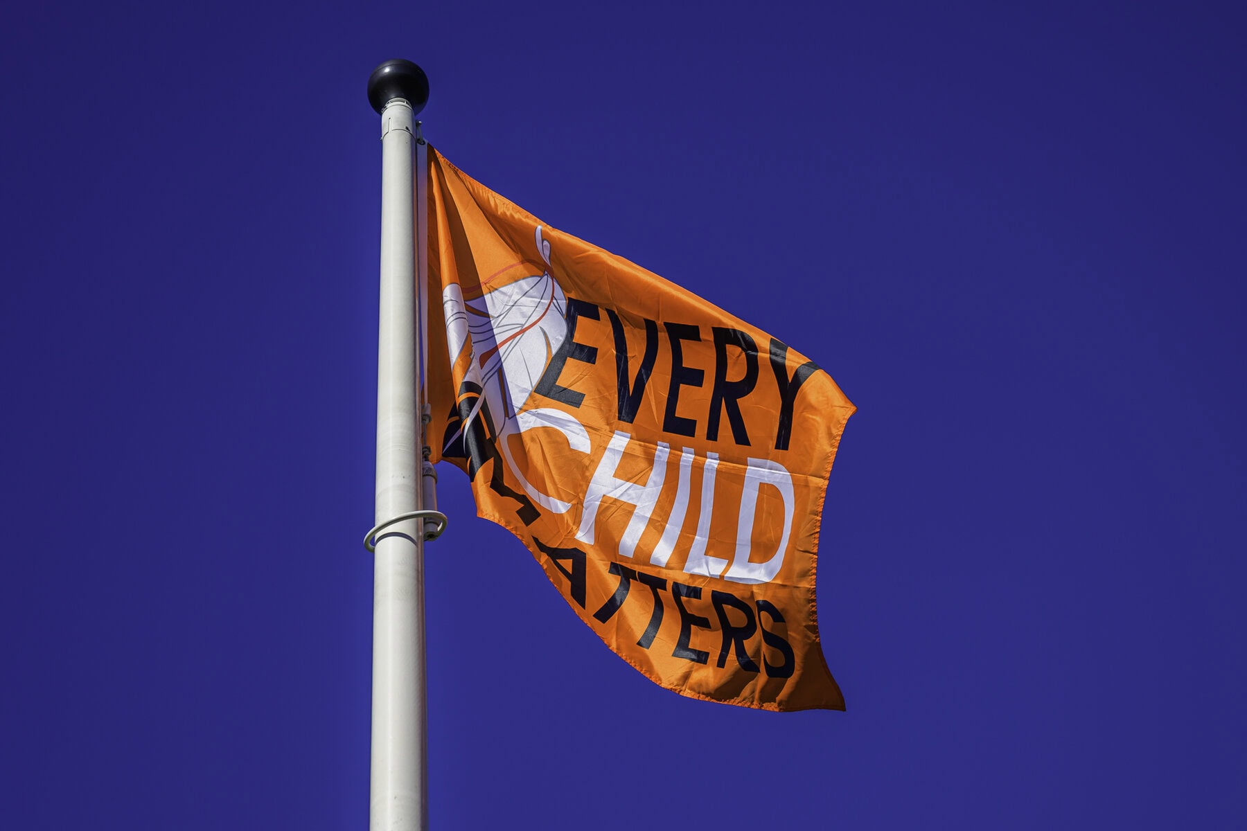 The town flag flies at half-mast outside the town administration building to mark Truth and Reconciliation Day until Oct. 1.