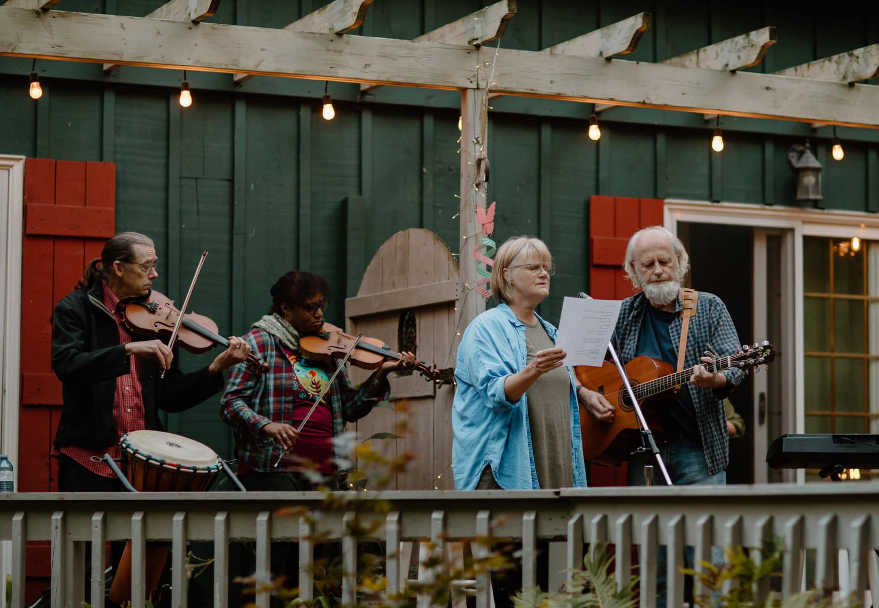 Elsewhere on Four Mile Creek Road, this band of local musicians and friends had a similar idea to DR MARS: they hosted a porch concert of their own for Play Music on the Porch Day, at the Applewood Hollow's back porch. From left, performing here are Peter Jellard, Ann Marie Saunders, Colleen Wilder and Brian Andres.