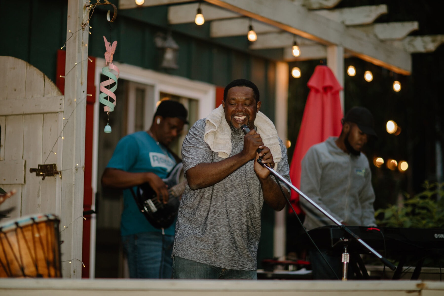 Curtis Thomas jams with the rest of his bandmates, who are all part of the Caribbean Workers Outreach Project's music team. He's accompanied by Ezekial Samuels on keyboard, Jason Moodie on conga drums and Richard Palmer on bass guitar.