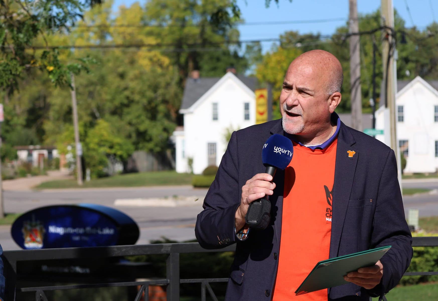 Tony Baldinelli, MP for Niagara Falls—Niagara-on-the-Lake, addresses the crowd at Monday’s ceremony. “Let us say today and every day, never again,” he said.