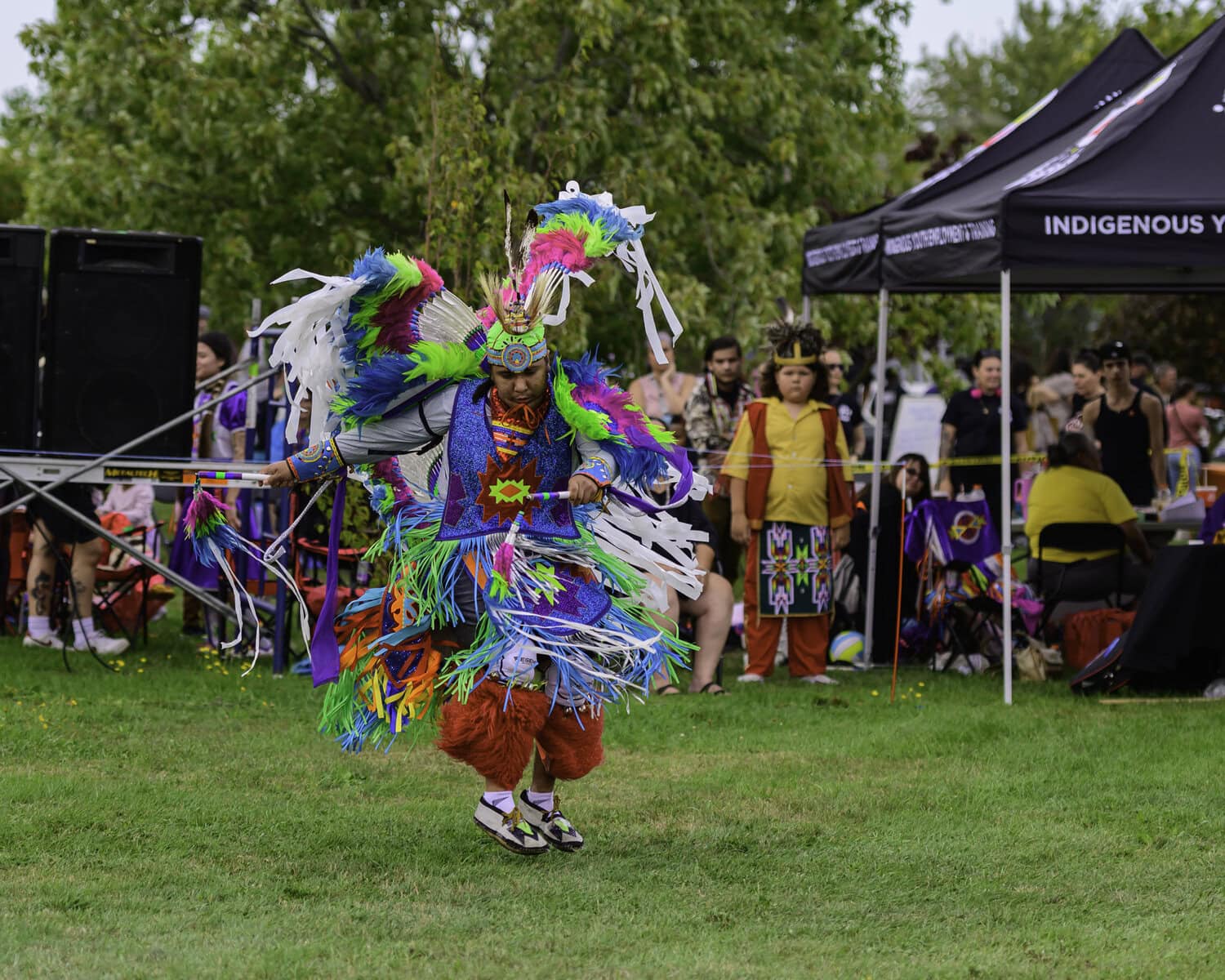 Tacoma Salter, from Bkejwanong/Oneida Nation, performing the fancy dance.