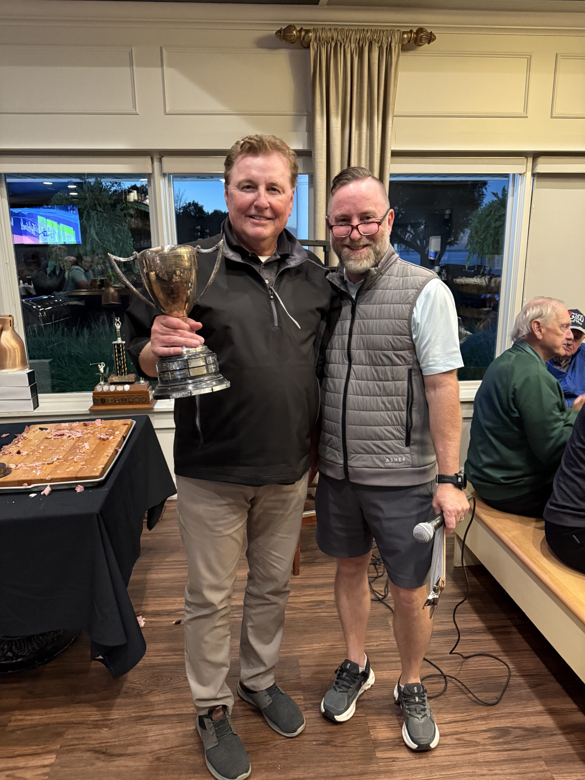 Carmichael Cup winner Dan Regan with pro shop manager Darren Smith.