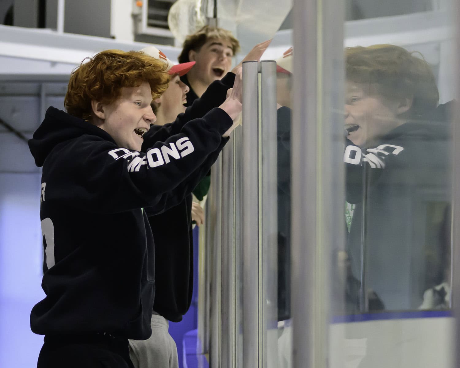 Devin Hunter, Cal Wilkens and Ethan Dulas erupt in celebration after the U13 Wolves find the back of the net on Sunday.