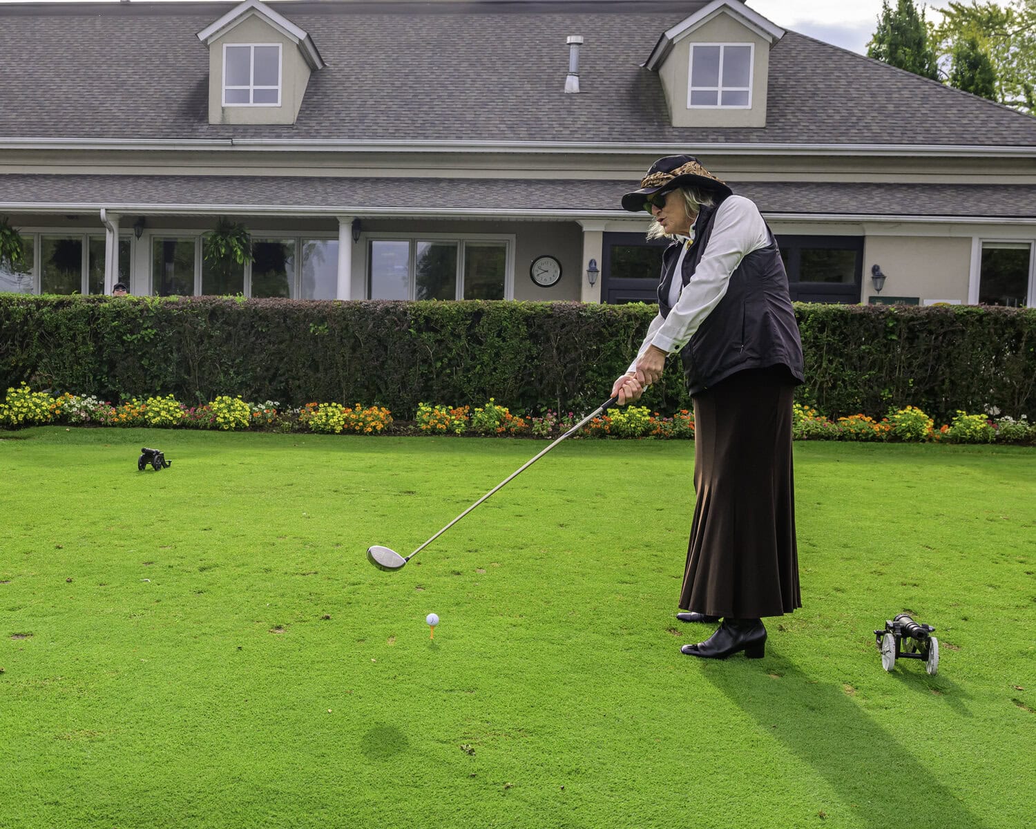 Dressed head-to-toe in gear reminiscent of the 1800s, NOTL's Barb Hastings prepares to tee off on the first hole Friday morning.
