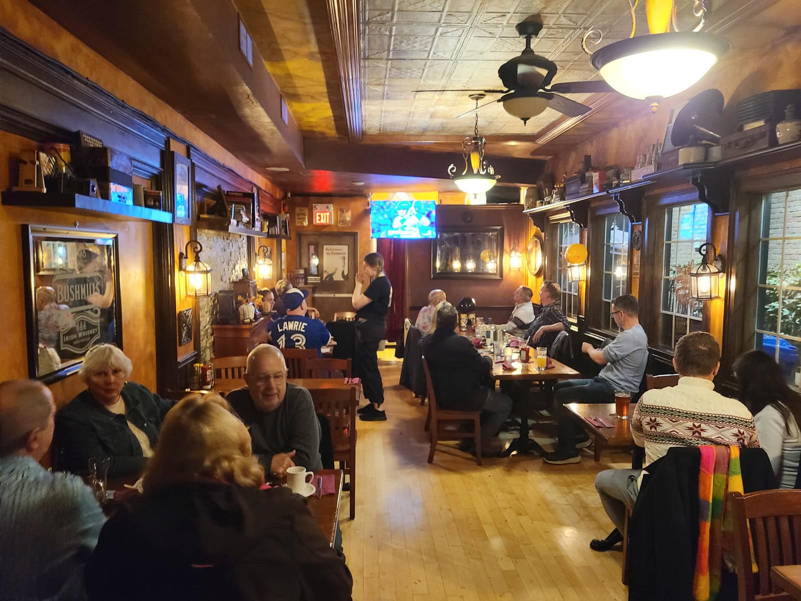 Patrons at the Irish Harp Pub in Niagara-on-the-Lake watch Game 1 of the World Series, where the Blue Jays returned to championship play for the first time since 1993.