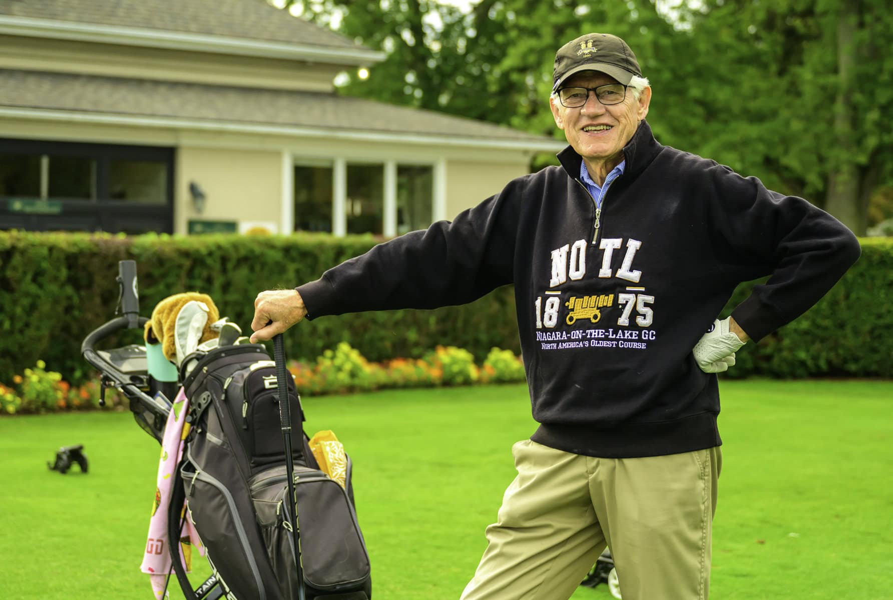 NOTL Golf Club member Mike Henry spots a sweater that celebrates the club's founding in 1875.