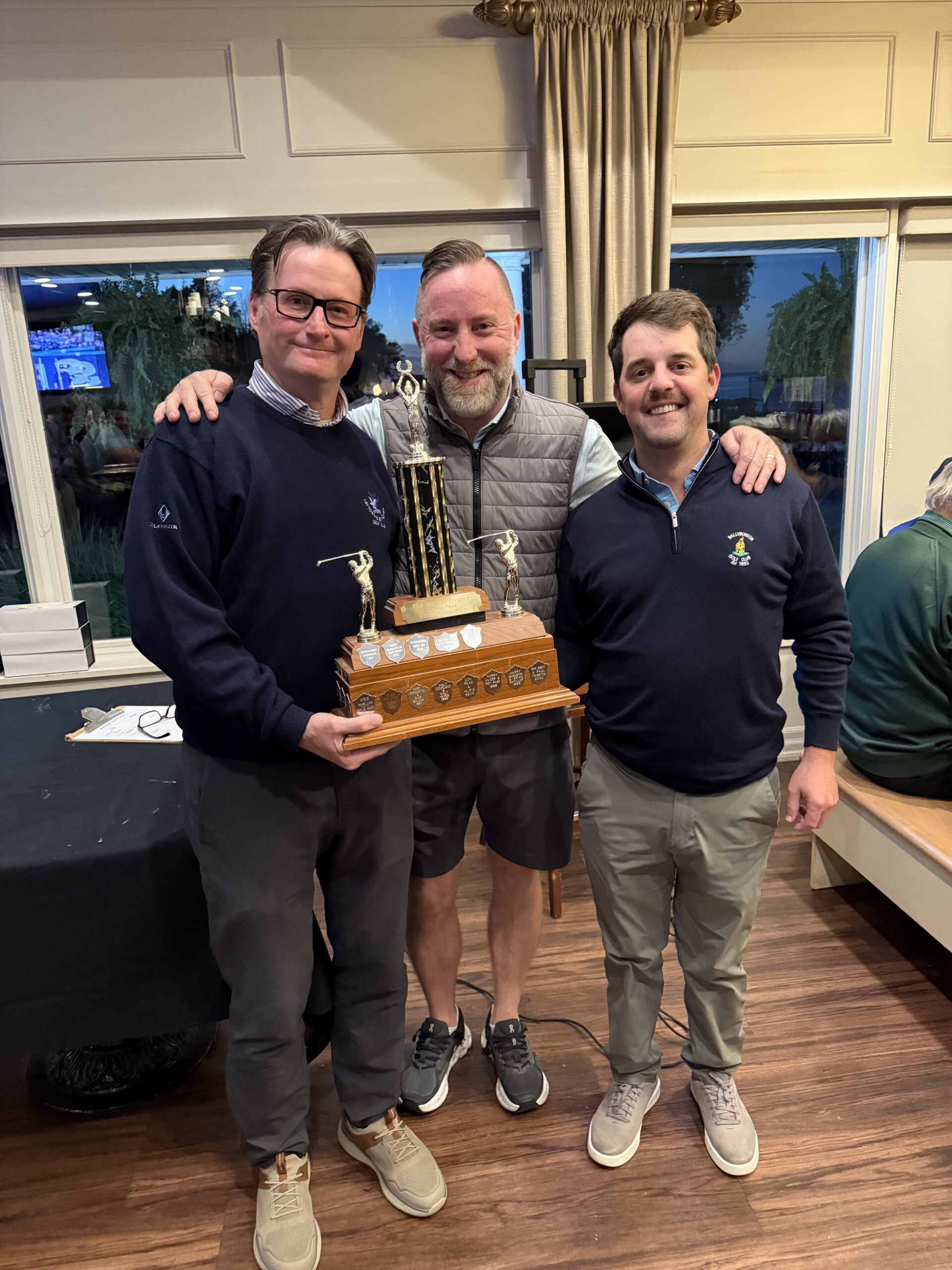 The Goldup pairs champs, Stephen Jenkins and Ricky Watson, flank pro shop manager Darren Smith.