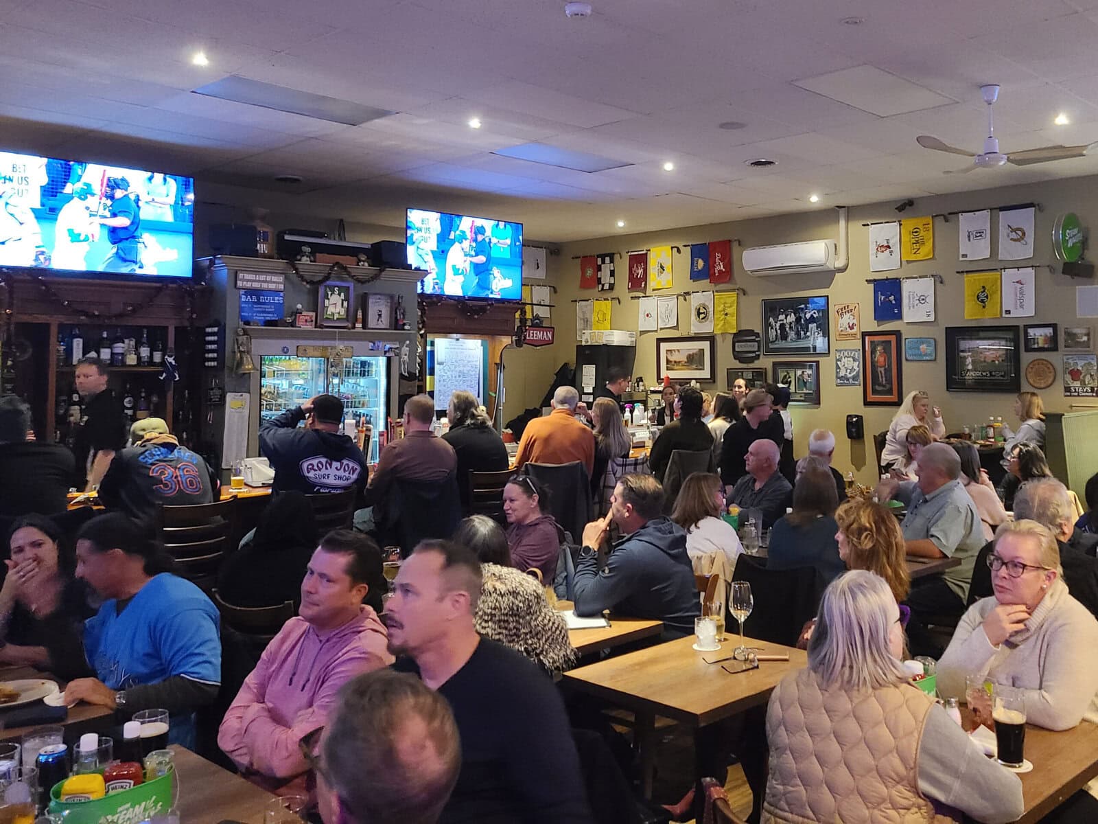 Blue Jays fans fill the bar at the Sandtrap Pub & Grill in Niagara-on-the-Lake during Fridayโs World Series opener against the Dodgers.