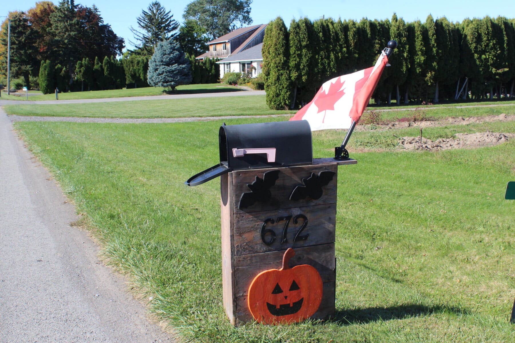 A little Halloween spirit comes together with a little Canadian pride at 672 East-West Ln.