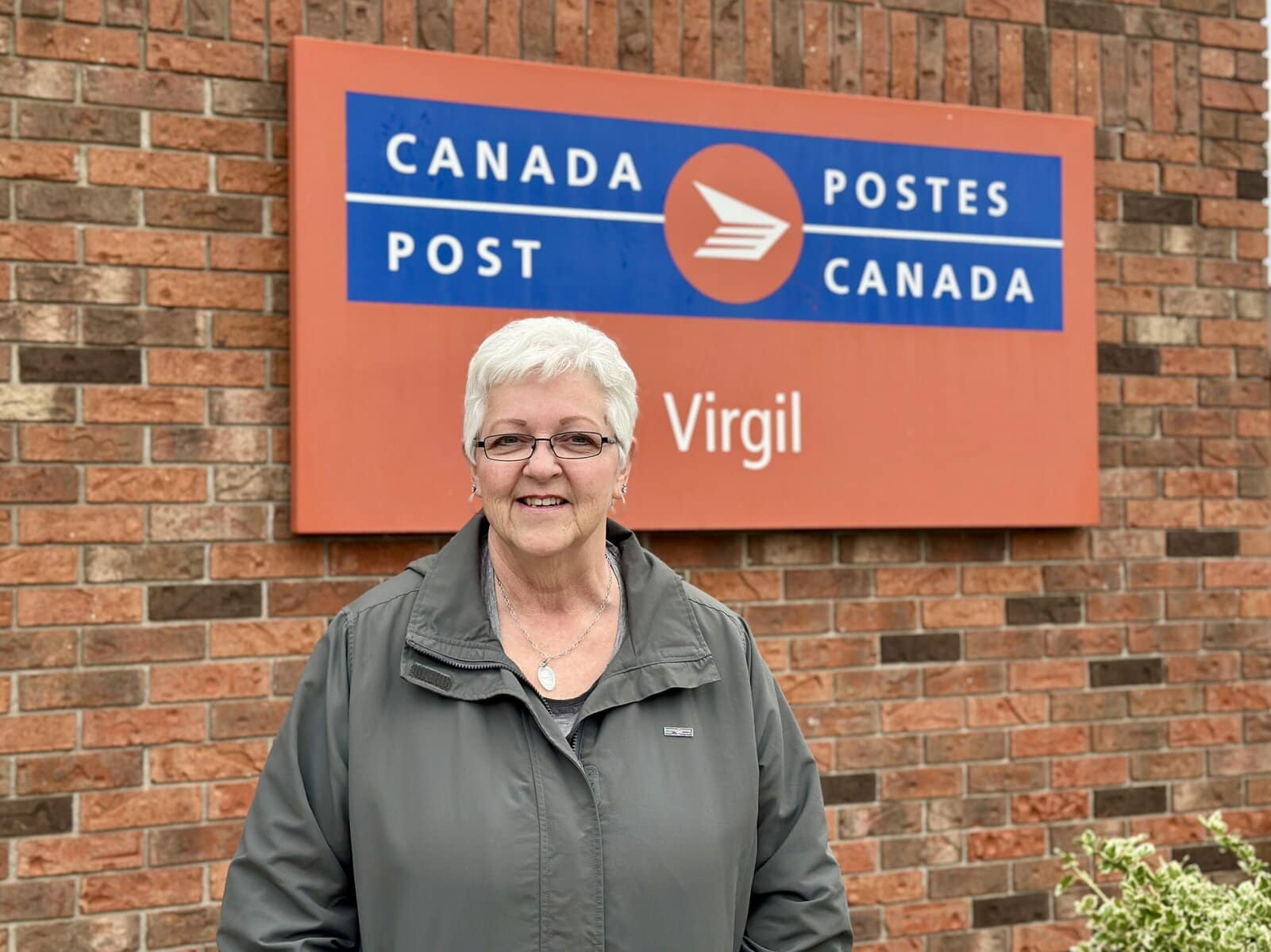 Postmaster Cindy Andrews Friesen stands in front of Virgil's Canada Post, marking the end of her 45-year career at the location. She said the people she worked with and served over the years were the highlight of it all.