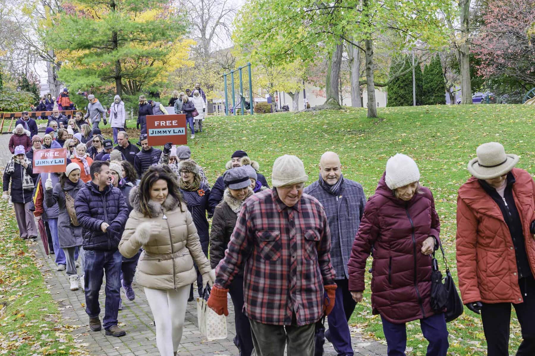 A group walks from Simcoe Park to the Queen’s Landing on Wednesday to advocate for the release of political prisoner Jimmy Lai, who has
been jailed in Hong Kong for his pro-democracy views since 2020. His niece Erica Lepp helped lead the charge. 