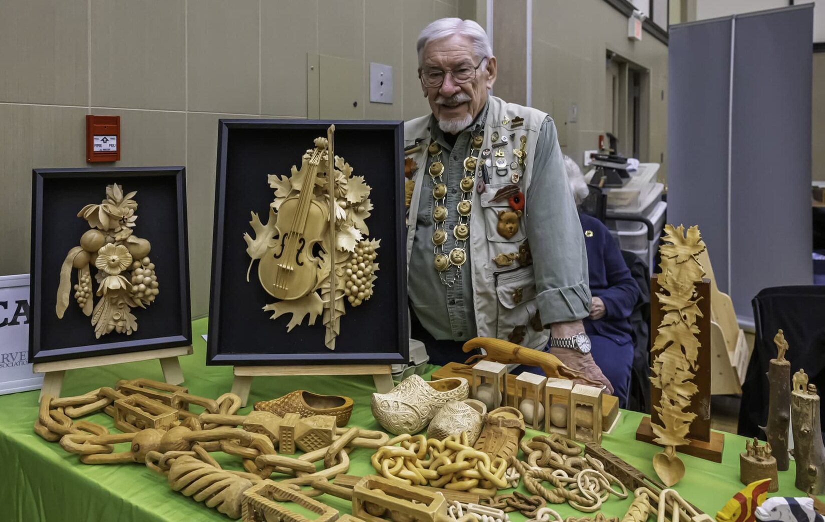 Murray Lincoln, 81, of Peterborough displays his intricate wood carvings, including works inspired by 17th-century sculptor Grinling Gibbons, at the Wonders of Wood show.