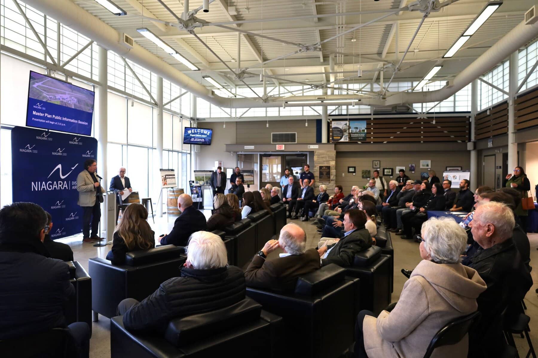 Standing beside commission chair Greg Wight, Lord Mayor Gary Zalepa speaks to residents about what he calls a “generational opportunity” for Niagara: a long-term vision he says could redefine the region’s role in aviation.